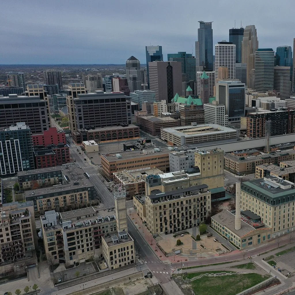 Downtown Minneapolis skyline from over St. Anthony Falls 2021-04-25