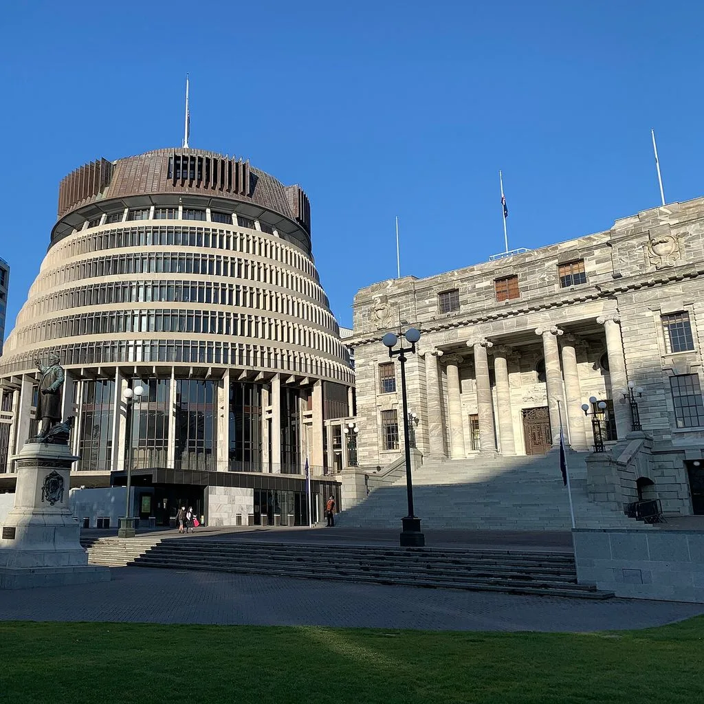 New Zealand Parliament buildings with flags at half-mast
