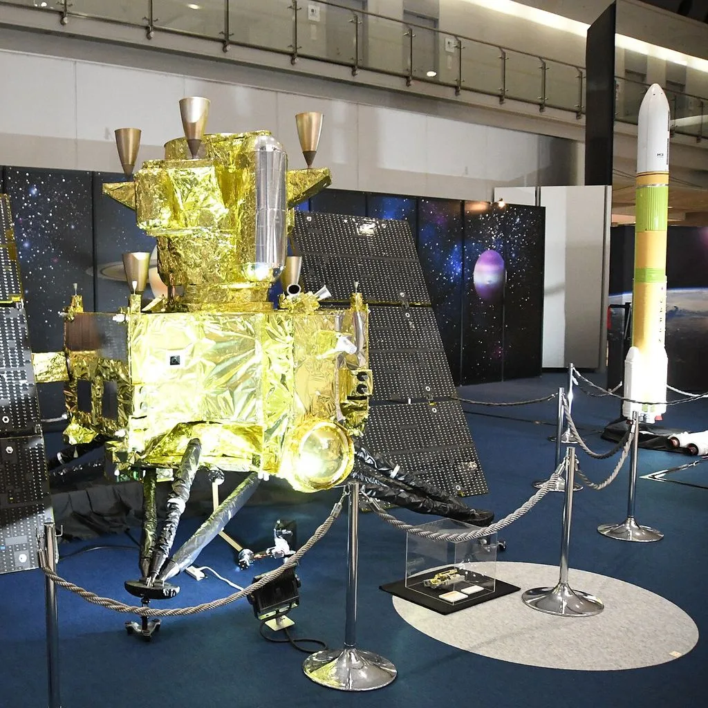 MMX spacecraft (scale model) left rear view in 1F atrium of JA2024 at Tokyo Big Sight October 19, 2024